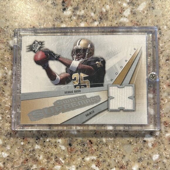 Swatch Supremacy Card with Gold and Black Accents of Reggie bush Rc mint cond - Picture 1 of 3